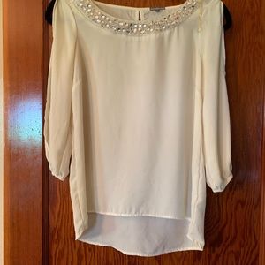Cream blouse with crystal embellishment